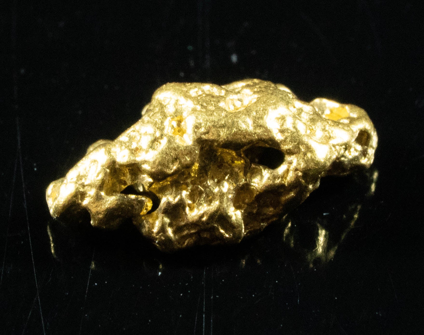 #837 Natural Gold Nugget Australian .68 Grams Genuine