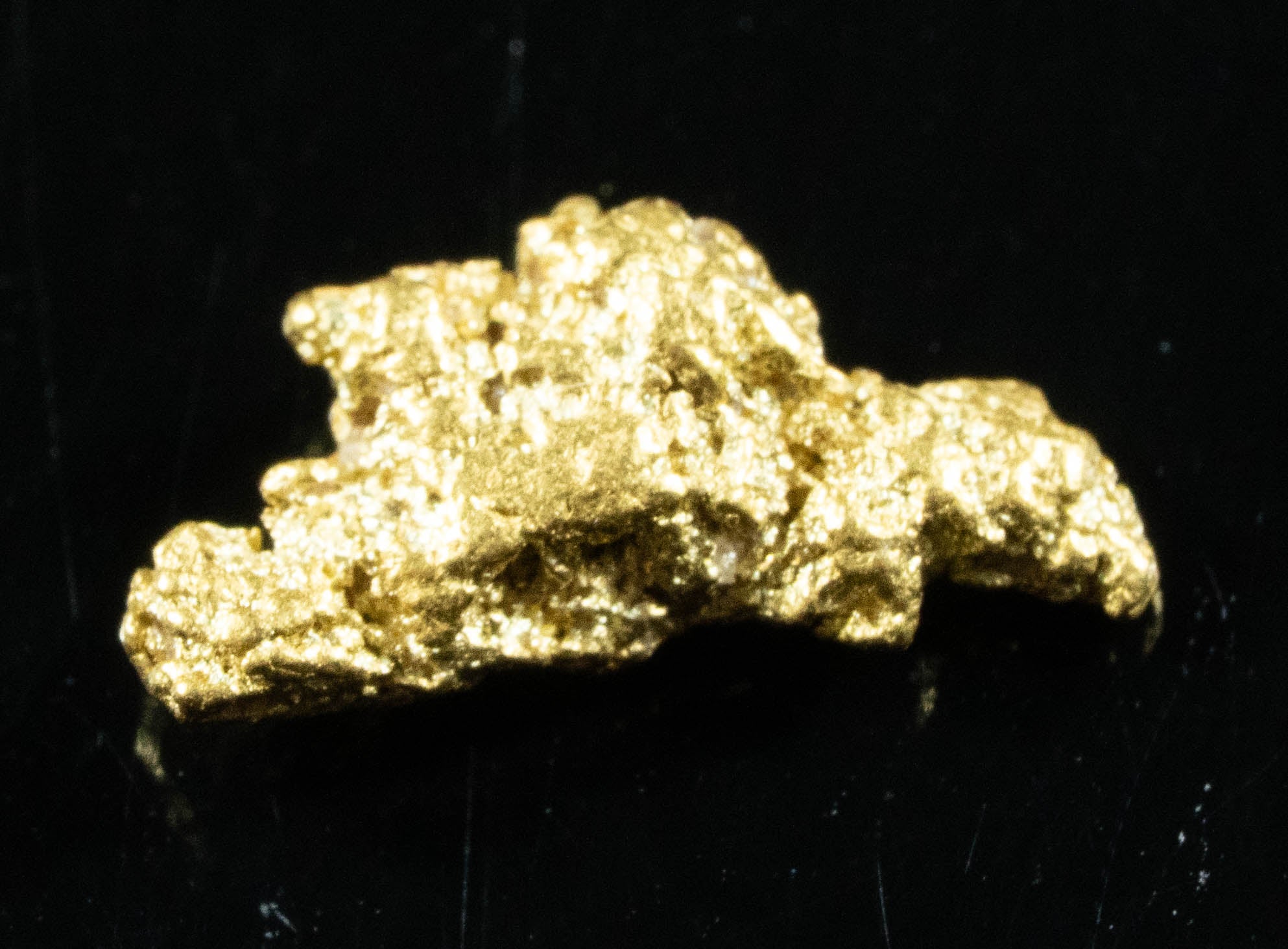 #845 Natural Gold Nugget Australian .56 Grams Genuine